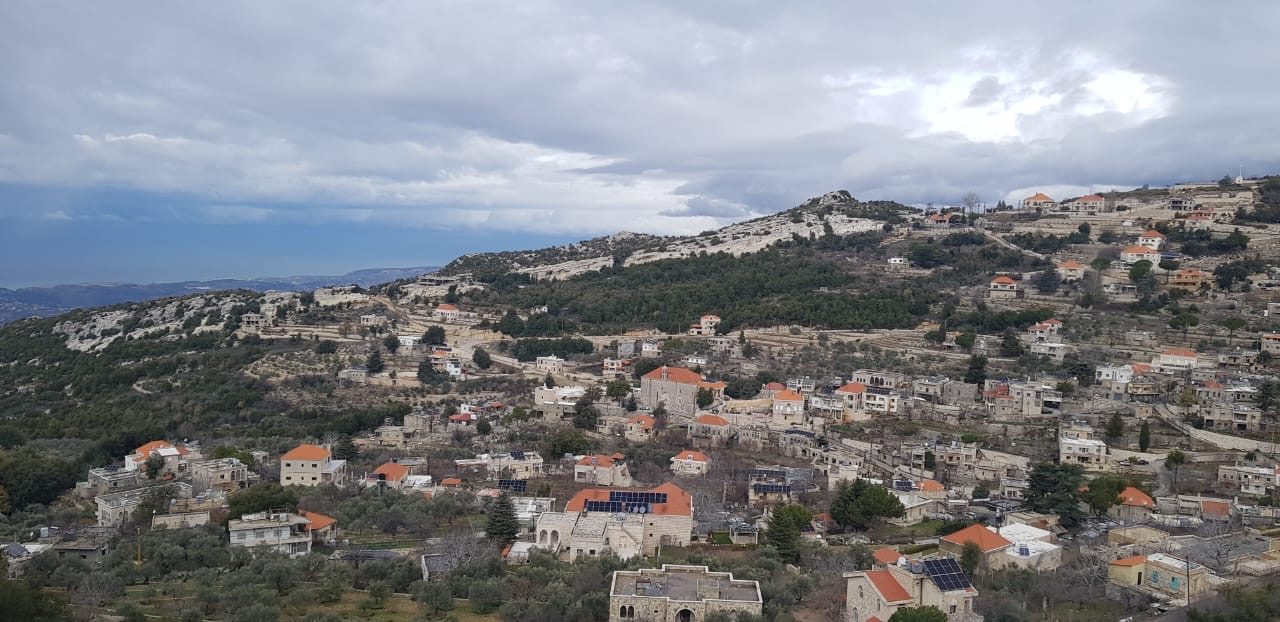 Red roofs and green slopes