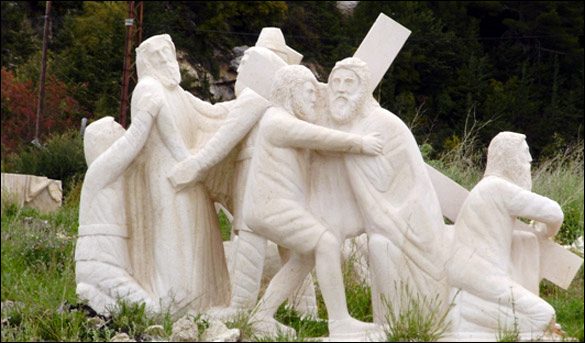 The Stations of the Cross, carved in white stone